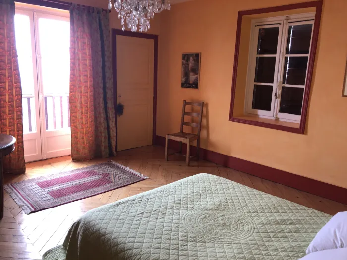 Chambre balcon de la grande maison
