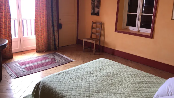 Chambre balcon de la grande maison